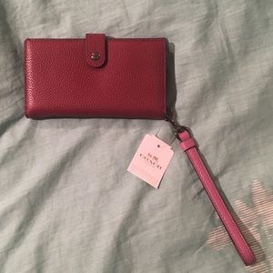 COACH pink/maroon cellphone wristlet